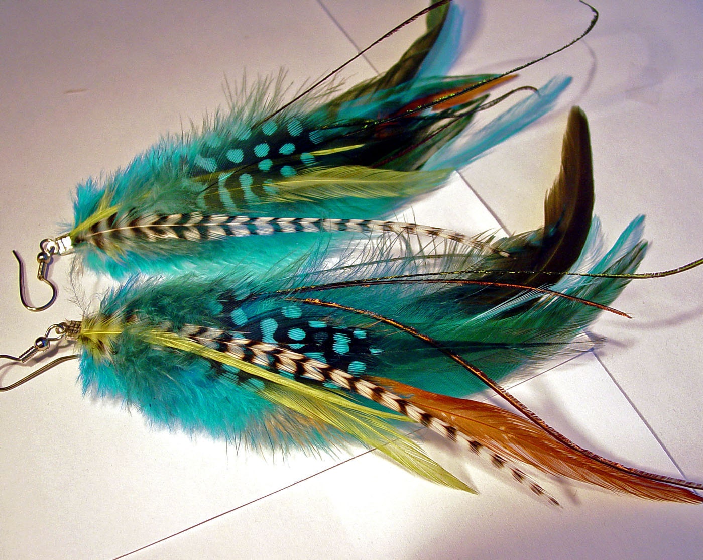 Teal blue black white grizzly feather earrings silver