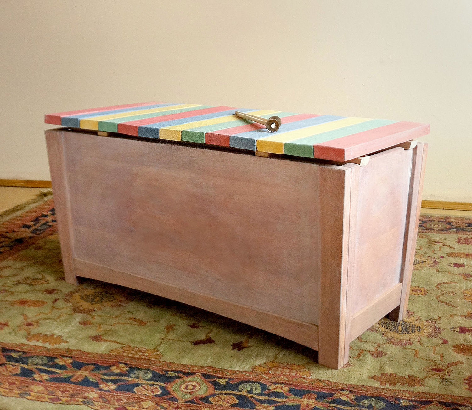 Wooden xylophone lid on cedar chest. Easy to play, built to last.