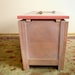 Wooden xylophone lid on cedar chest. Easy to play, built to last.