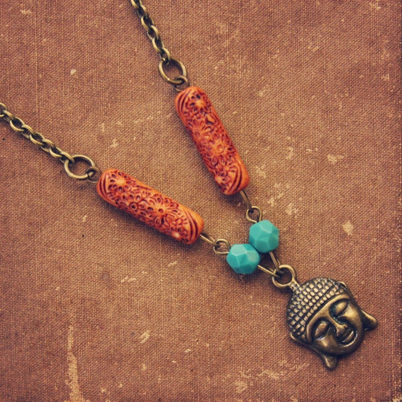 namaste.  a simple rust and teal buddha necklace.