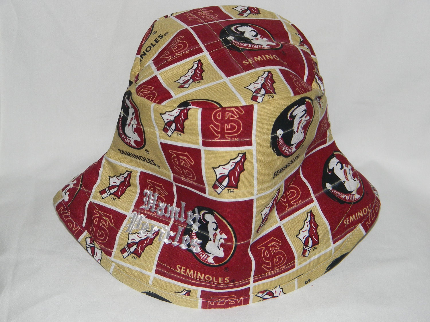 FSU gold-burgundy bucket hat by Hamlet Pericles