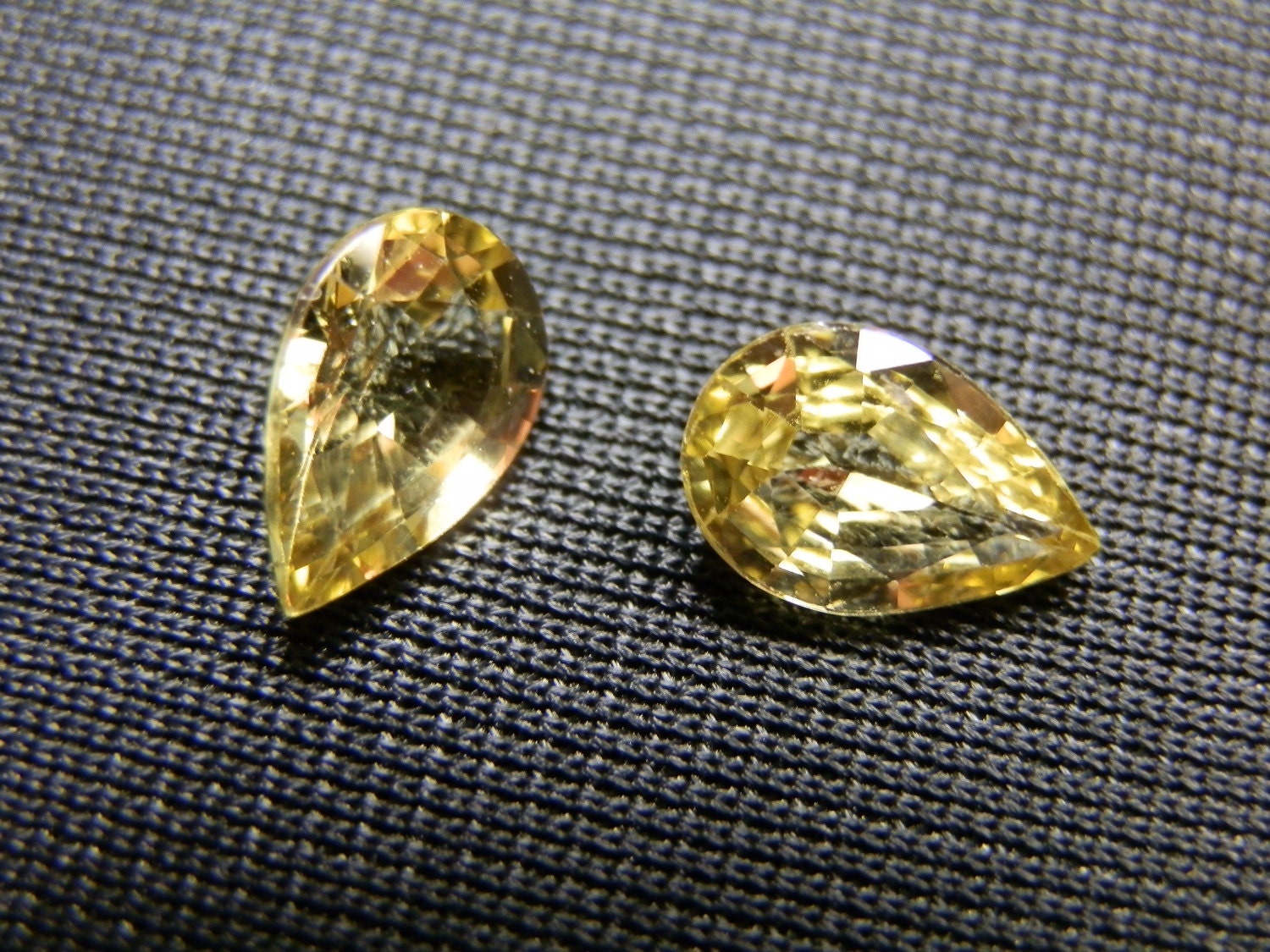 Very rare yellow Mali Garnets. A pair of pear shapes. 1.67 ct total. 2 loose gemstones. - DanPickedMinerals