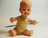Vintage baby doll. Use for mixed media art, shadow boxes, photography projects,composition, etc.
