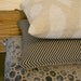 Natural beige ikat dots decorative pillow cover