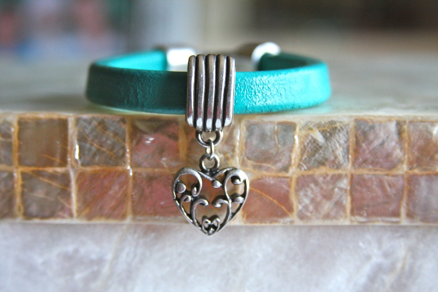 Turquoise leather bracelet with pewter slide bead, pewter heart charm and pewter clasp - HollyMackDesigns
