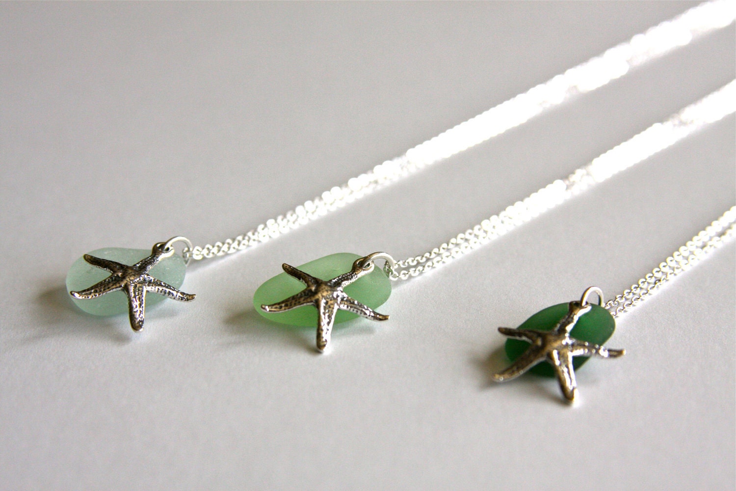 Sterling silver necklace with sea glass and sterling silver star fish charm
