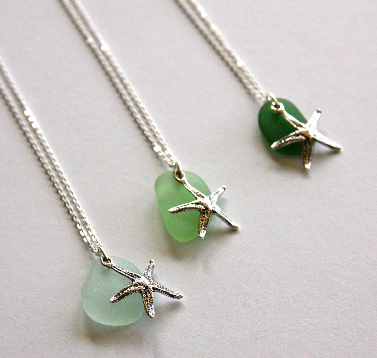 Sterling silver necklace with sea glass and sterling silver star fish charm