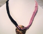 Hemp choker with Rhodonite doughnut Pink and black. N053
