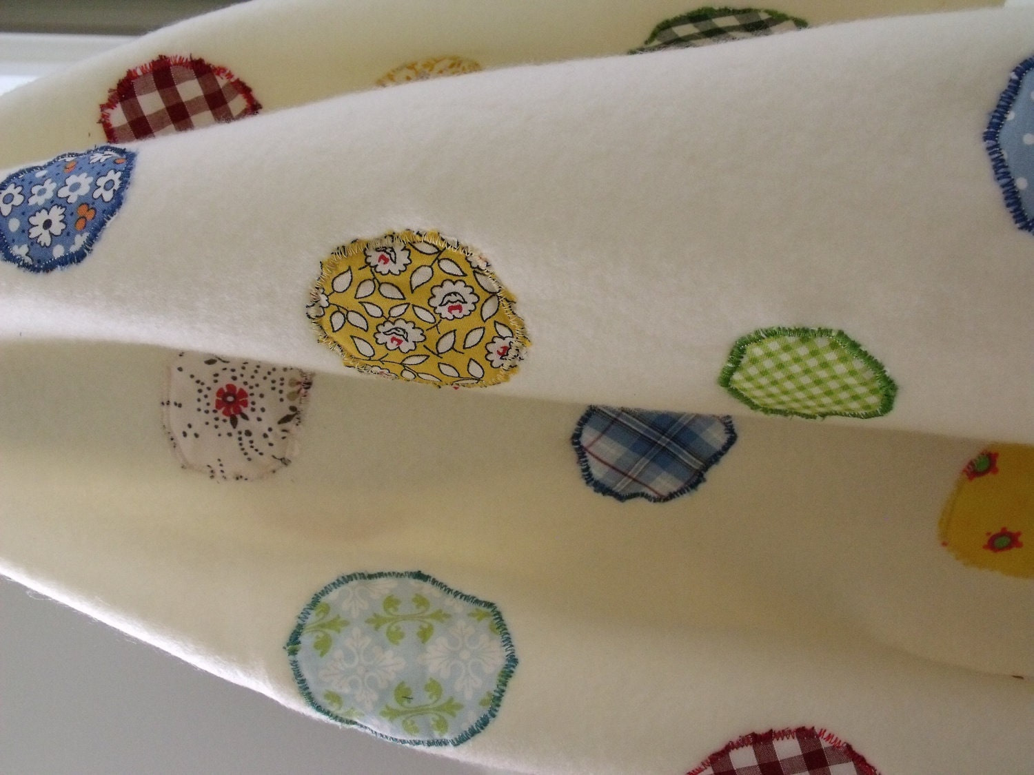 white unisex baby blanket  with circles