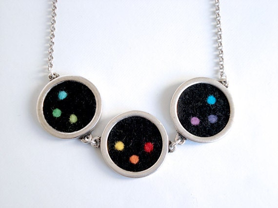 Felt and metal pendant necklace. Black felt combined with 9 different colors