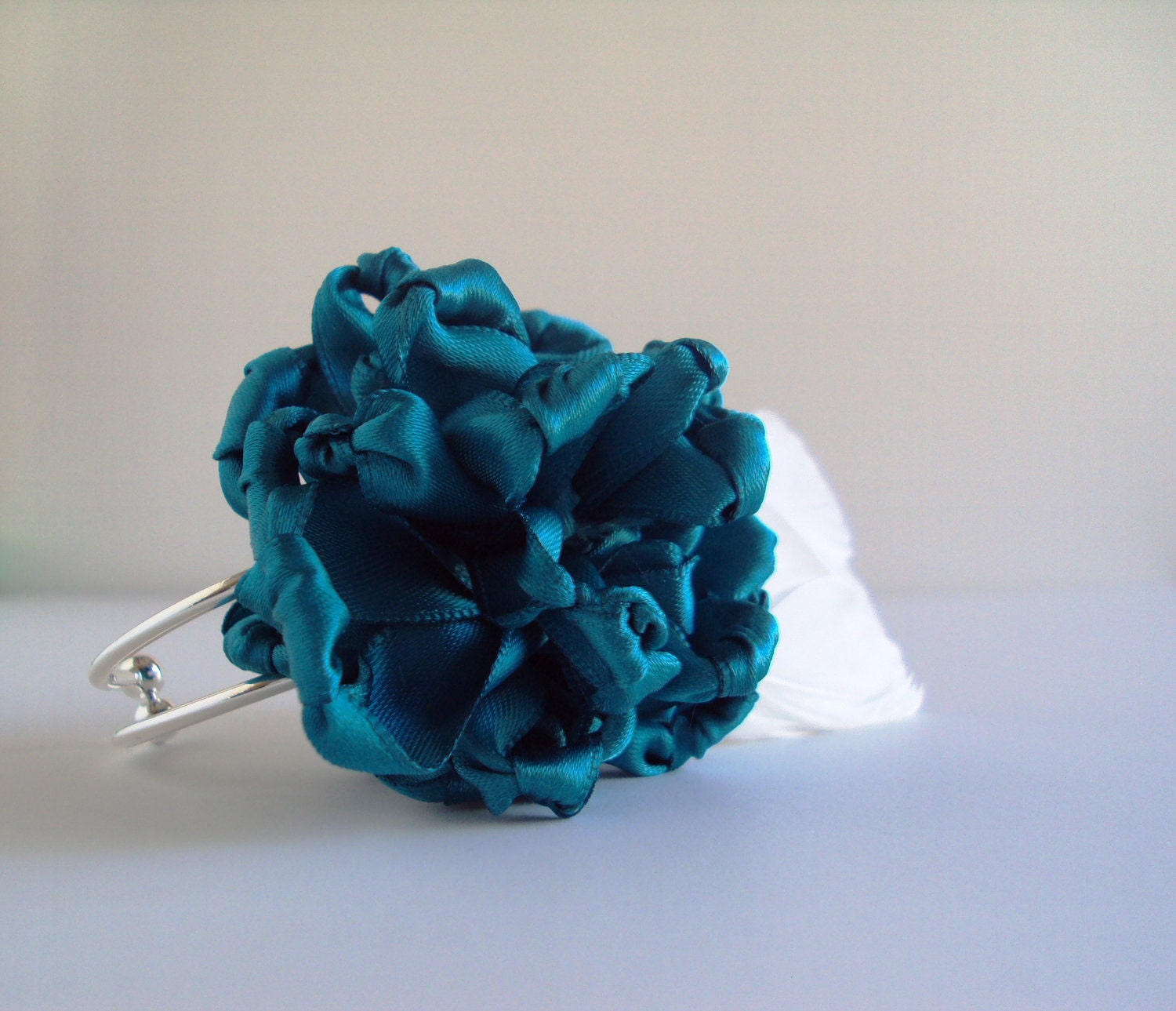 Feather and Fabric Corsage with Silver Bracelet