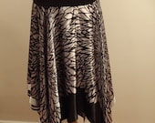 assymetrical length satin skirt black & silver