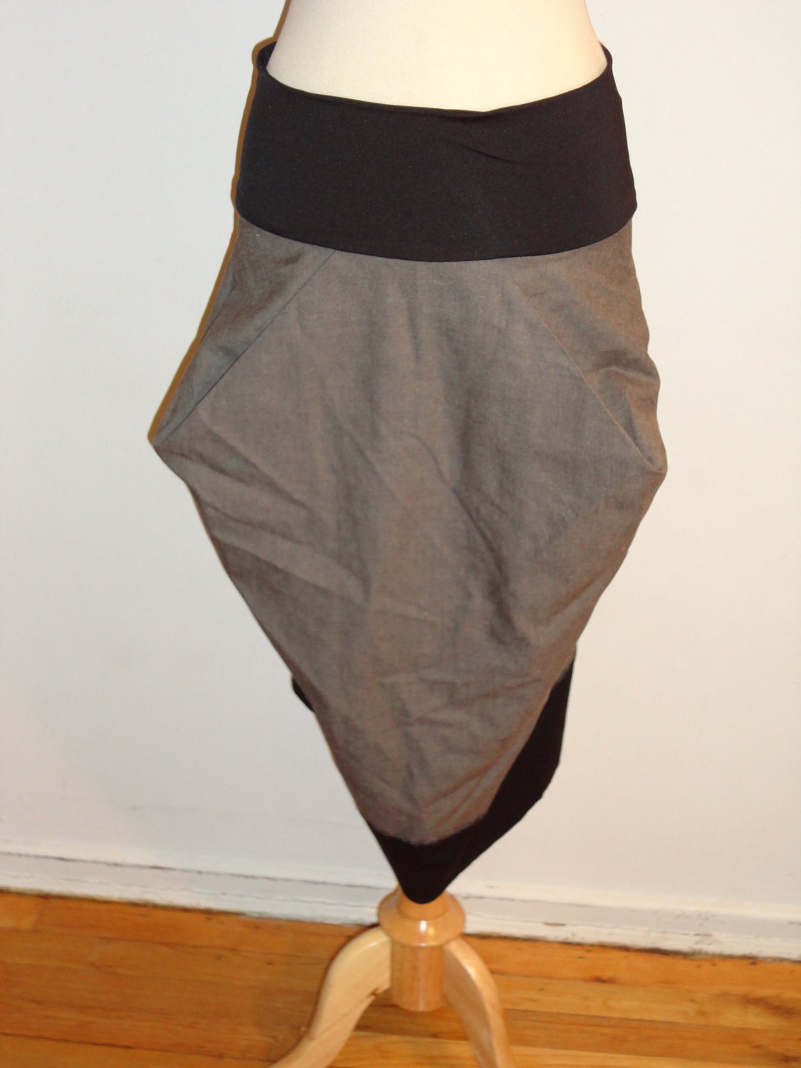 three quarters length designed skirt, assymetrical length, gray & black,