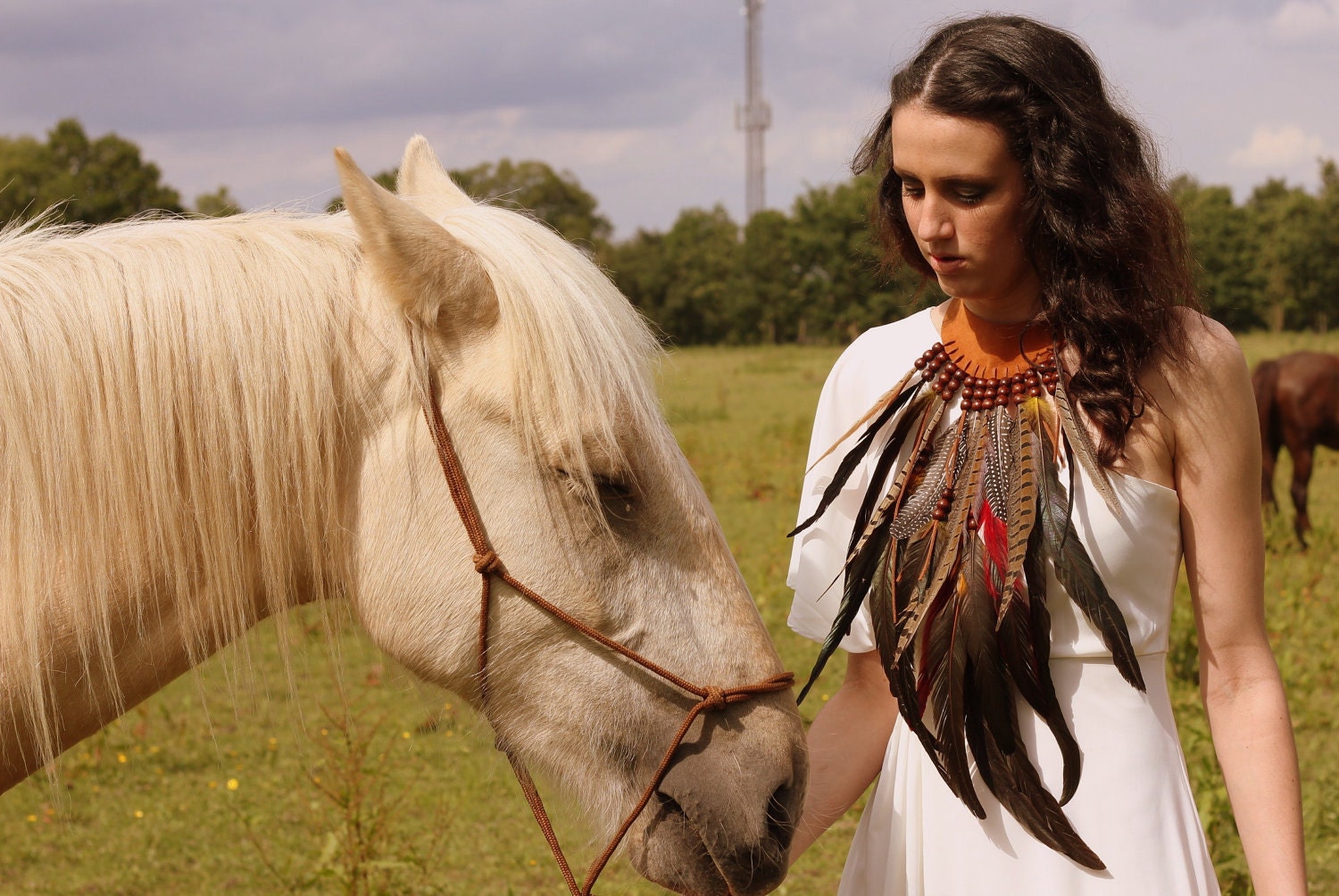 Feather and leather necklace
