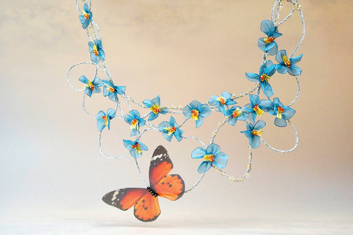 Statement linen necklace with forgetmenot and butterfly. Floral wearable art jewelry. Fairy wedding bijoux for spring bride.