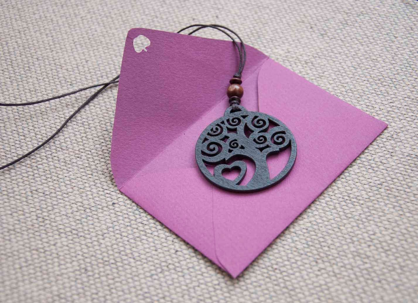Wooden pendant necklace with tree and heart