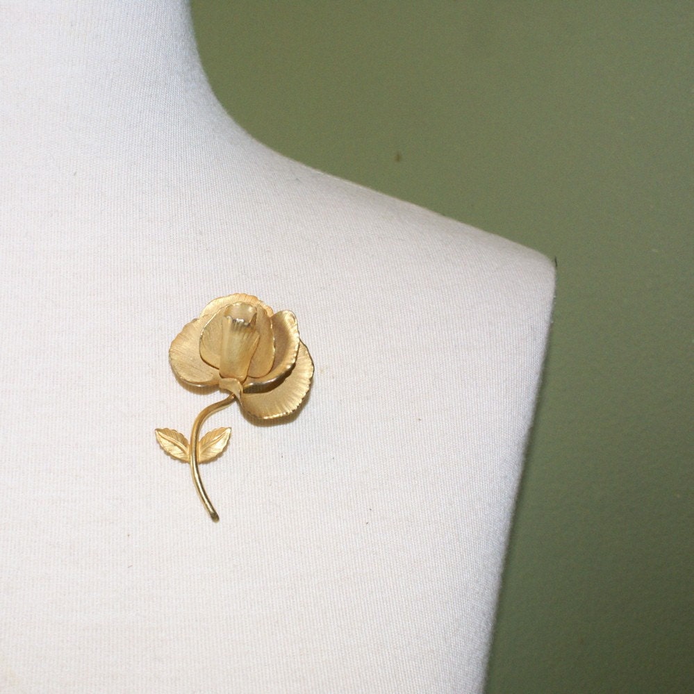 gold rose brooch