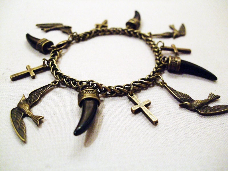 Swallow, Cross and Tooth Antique Gold Charm Bracelet