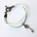 Braided Blue and Cream Silver Key Friendship Bracelet with Toggle Clasp