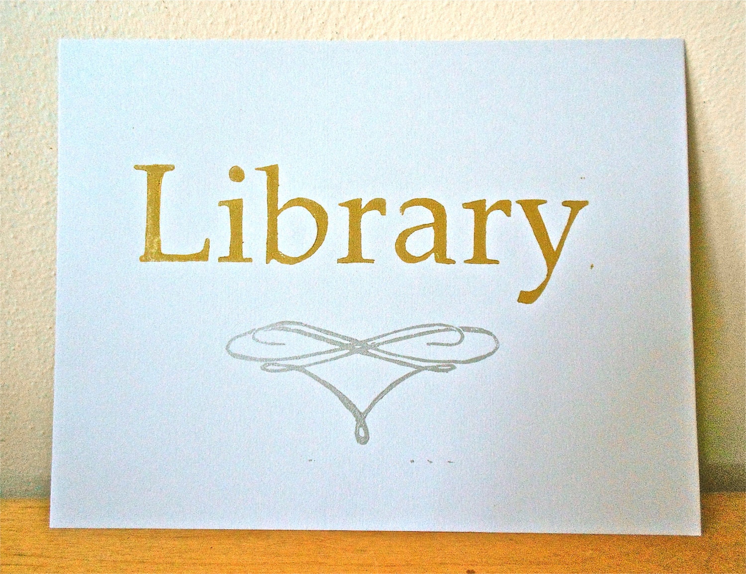 Library Sign Handmade Block Print in Gold Letters and Silver Filagree on Off White Paper