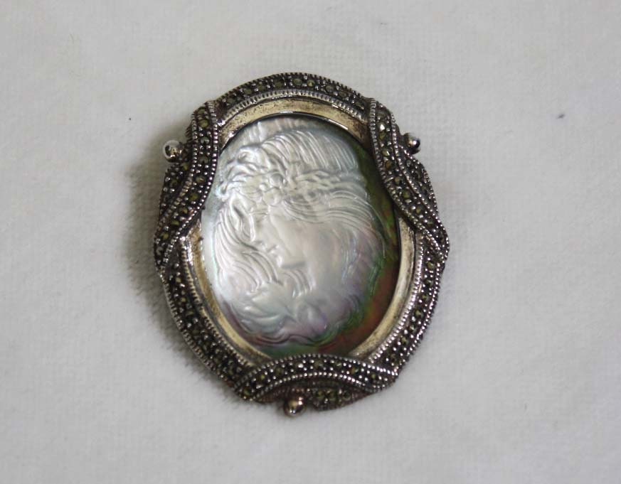 Vintage Sterling Silver Brooch with Engraved Mother of Pearl Center