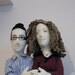A couple of portrait dolls in cloth.