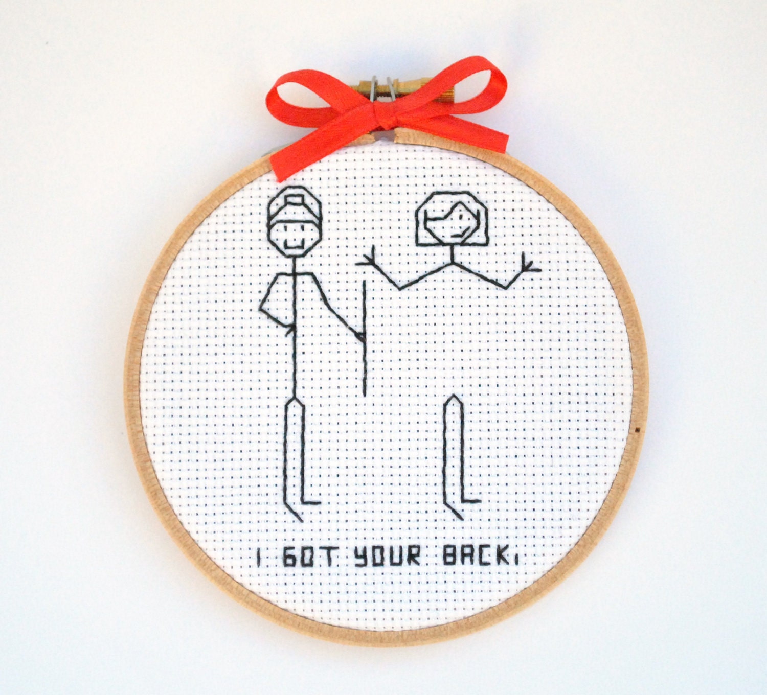 As seen in Glamour Magazine, Stick Figure Wall Hanging, "I Got Your Back"