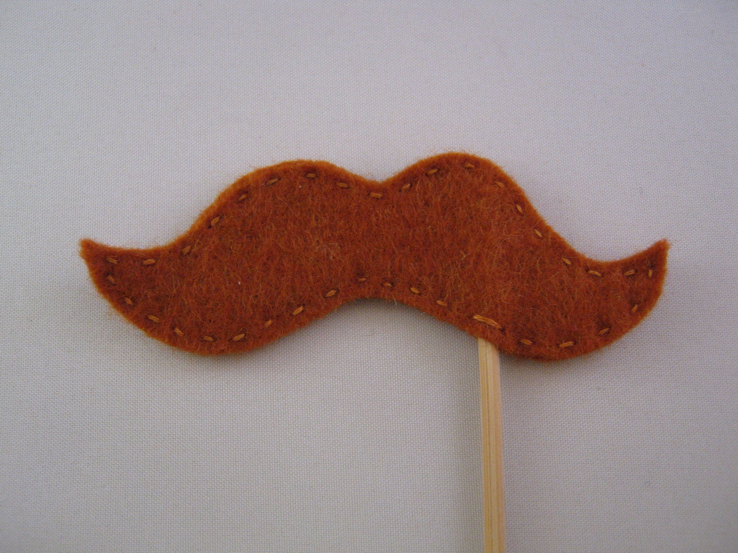 Rusty Brown Felt Moustache on a Stick