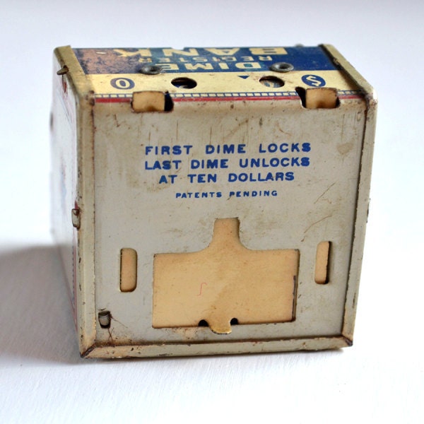 Vintage J. Chein & Co. tin litho Dime Register Bank 2 inches tall  offered by Elizabeth Rosen