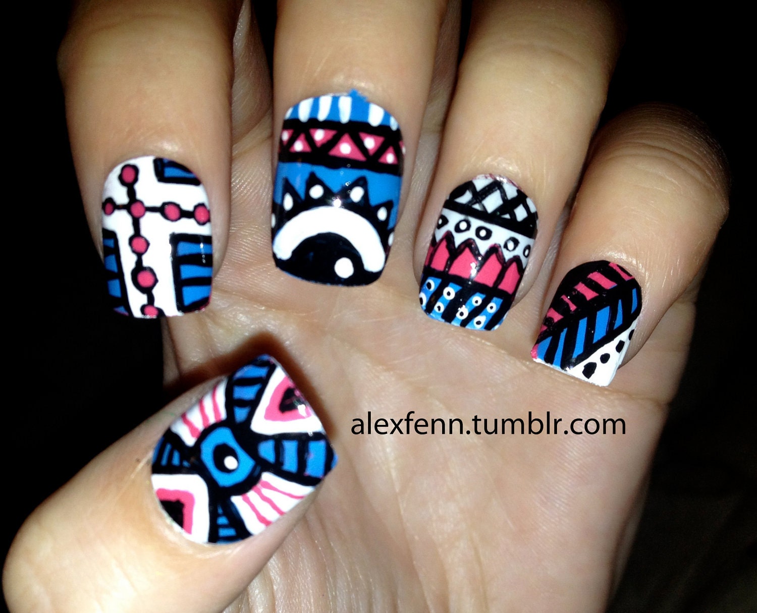 Blue and pink aztec eye nails