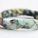 Fabric bracelet. Pastel fabric hand braided with antique copper metal rings.Mint, rose, blue and green colors. Medium size