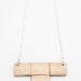 Bronze tetris T block necklace