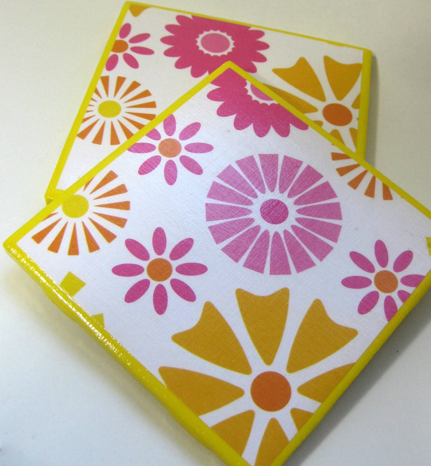 Two Yellow Ceramic Tile Coasters with Retro Flowers in Pink, Orange, and Yellow