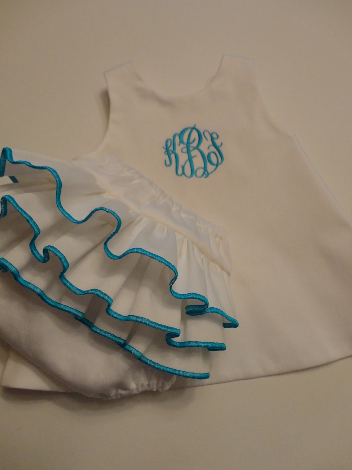 Monogrammed open back baby dress with ruffle diaper cover set turquoise
