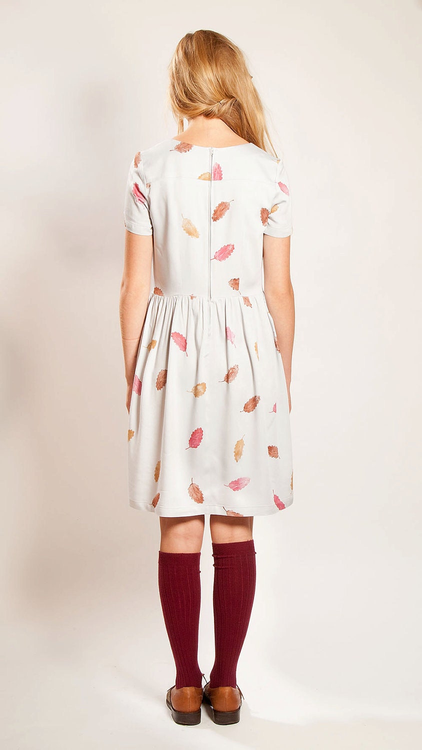 The 'Falling Leaves'  hand printed bamboo sateen dress with sleeves, gathered skirt, and hip pockets
