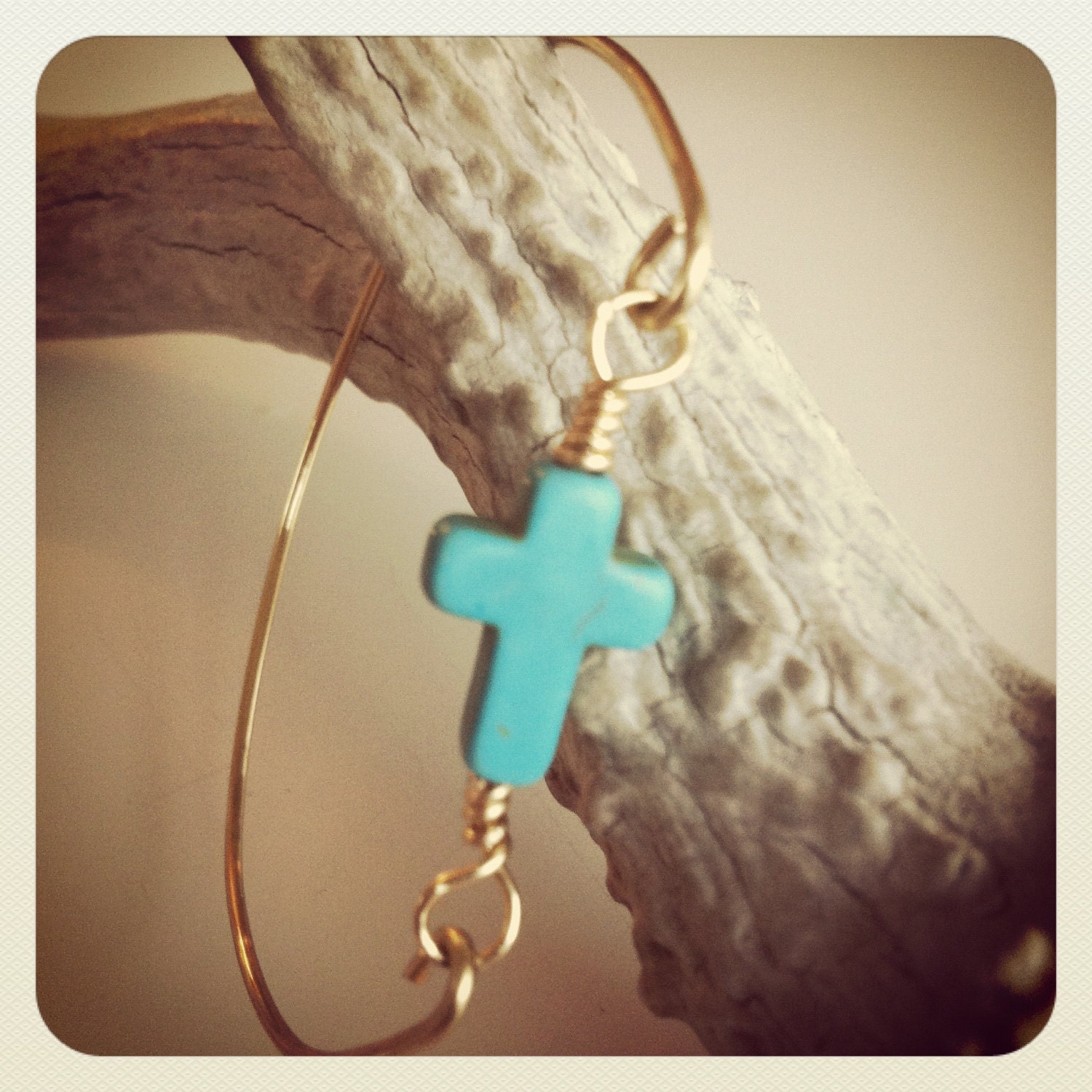 Turquoise stone cross and gold plate wire bangle