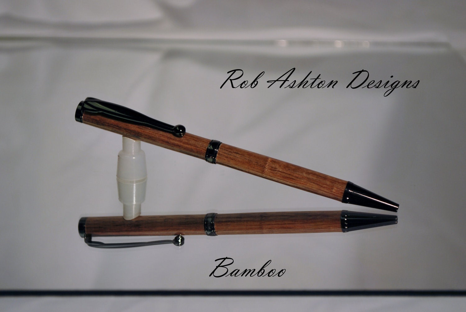 Slimline Bamboo ballpoint pen trimmed with black titanium finish