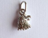 1  eagle head sterling silver charm, pendant, dangle, cast 3D design, 11x7mm, cast, US made, jump ring included. (CHMSS).