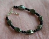 Elegant silver and black shiny friendship bracelet