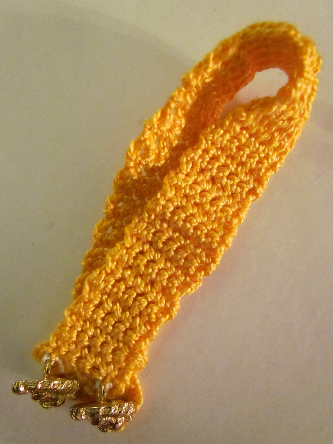Crochet Bracelet in Yellow with Gold Lion Buttons
