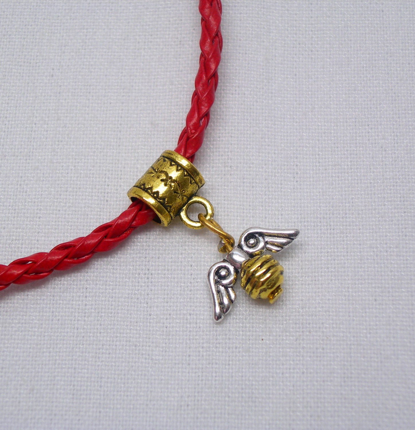 Harry Potter Inspired Golden Snitch Pendant on Your Choice of Color Braided Leather Necklace
