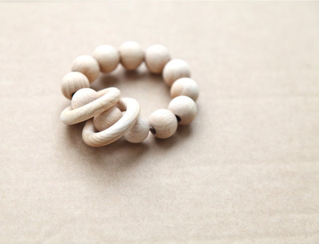 Teething ring toy with wooden beads and 2 wooden rings. Neutral waldorf wooden beads rattle.