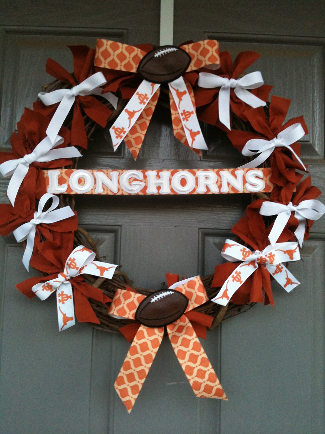 University of Texas wreath with monogrammed door hanger