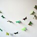 Green paper butterflies garland - wall decor