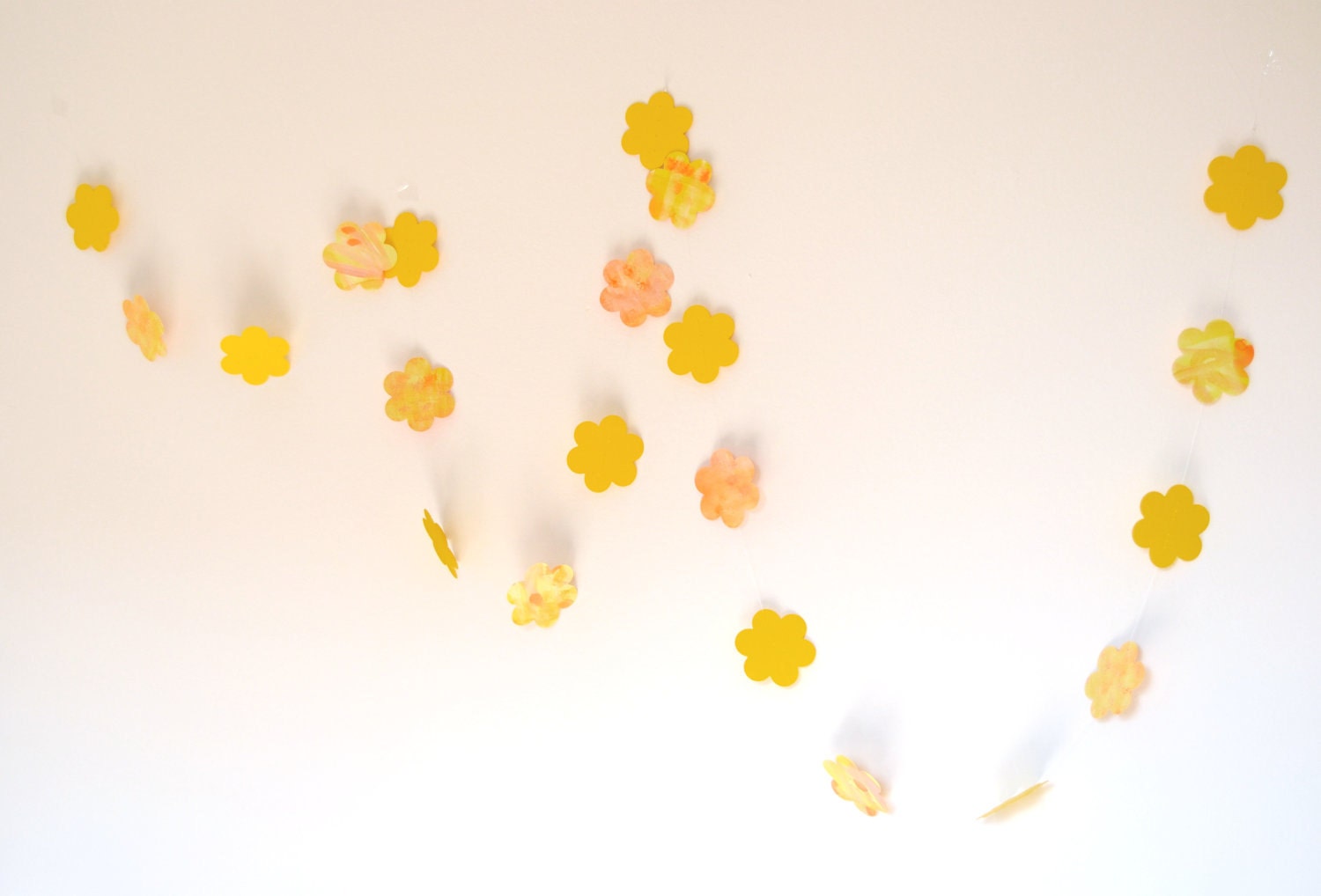 Yellow garland with paper flowers