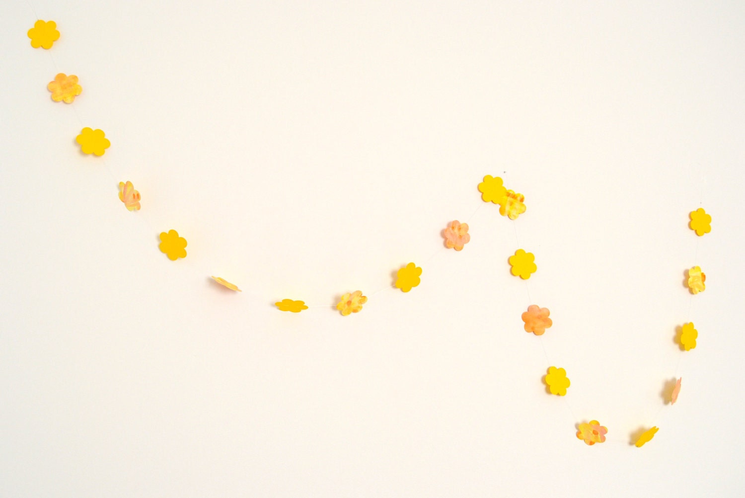 Yellow garland with paper flowers