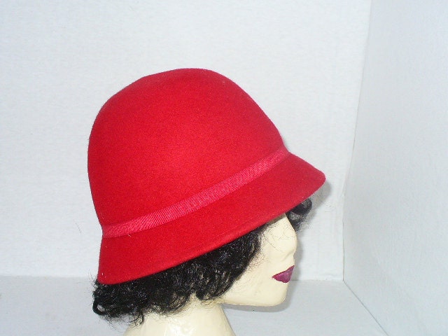 Womens Red Cloche felt hat Black silk flower rhinestones and feathers.