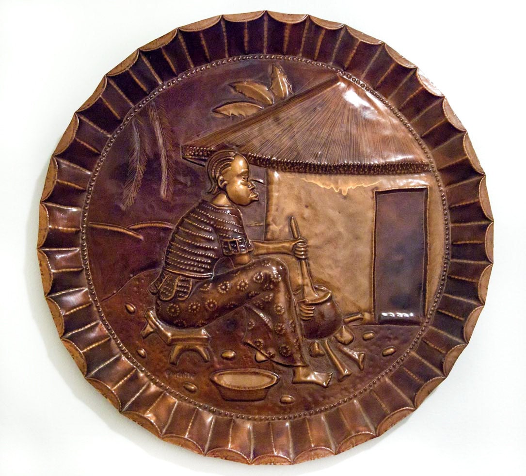 African Woman Round Hammered Copper Art