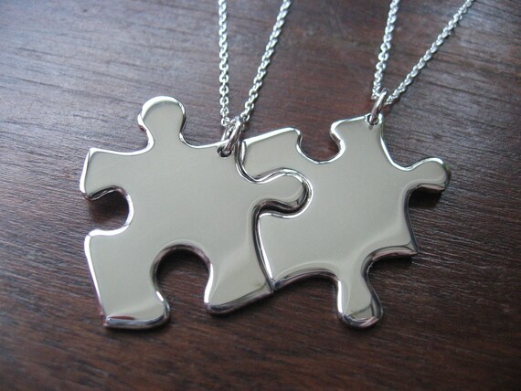 Two Silver Puzzle Piece Pendants