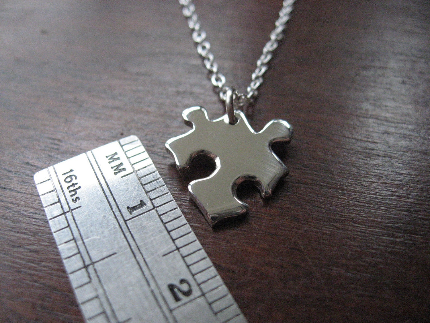 Two Miniature Puzzle Piece Pendants on one Necklace